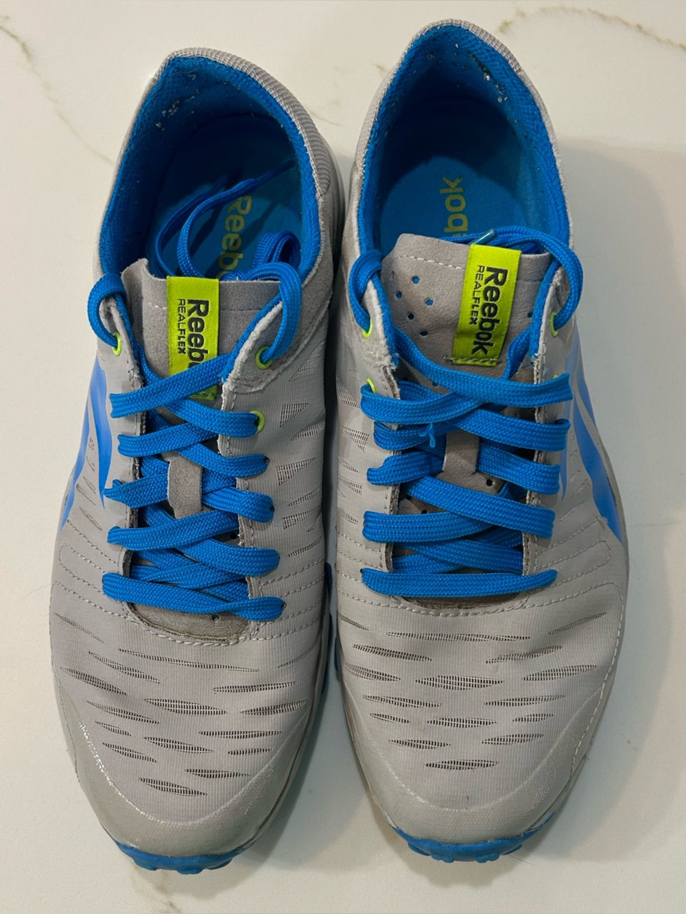 Reebok Gray Athletic Sneakers with Bright Blue Laces and Neon Accents
